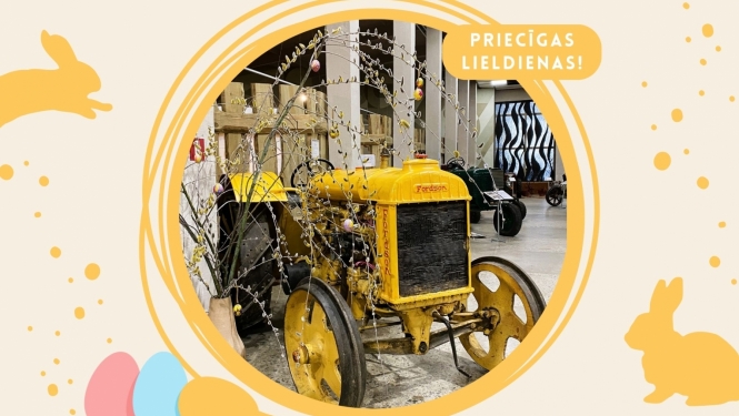 Dzeltens traktors zem stilizēta pūpolkoka ar iekārtām olām tajā, muzeja telpā, dizainētā aplī. Fonā dzelteni zaķi un krāsainas olas
